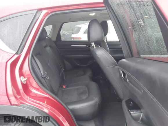 ✅ 2020 Mazda CX-5 Touring • VIN: JM3KFBCM4L1770791 • Lot: 43990987. Listed on IAAI with 99,874 mi. Free auction sales archive from the USA and detailed vehicle history report at DreamBid. Image 8.