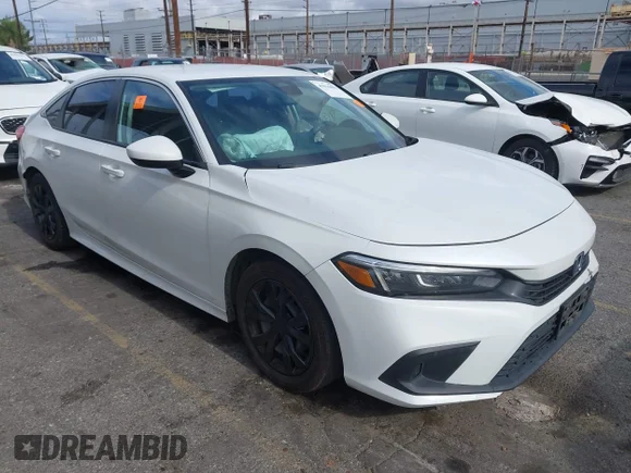 ✅ 2022 Honda Civic LX • VIN: 2HGFE2F28NH523089 • Lot: 45016001. Listed on IAAI with 124,535 mi. Free auction sales archive from the USA and detailed vehicle history report at DreamBid. Image 1.