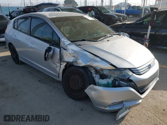 ✅ 2010 Honda Insight LX • VIN: JHMZE2H57AS038365 • Лот: 44728180. Опубликован ранее на IAAI с пробегом 172 002 миль. Бесплатный доступ к архиву аукционных продаж из США и подробный отчёт об истории автомобиля на DreamBid. Изображение 1.