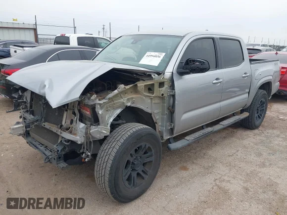 ✅ 2018 Toyota Tacoma SR • VIN: 5TFAX5GN9JX130494 • Lot: 44994856. Wystawiony na IAAI z przebiegiem 123 594 mil. Bezpłatny archiwum sprzedaży aukcyjnych z USA i szczegółowy raport historii pojazdu na DreamBid. Zdjęcie 2.