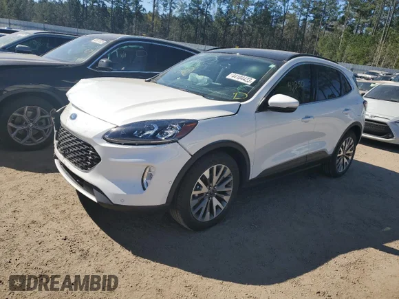 ✅ 2020 Ford Escape Titanium Hybrid • VIN: 1FMCU9DZ5LUB70152 • Lot: 44104423. Wystawiony na Copart z przebiegiem 40 350 mil. Bezpłatny archiwum sprzedaży aukcyjnych z USA i szczegółowy raport historii pojazdu na DreamBid. Zdjęcie 1.