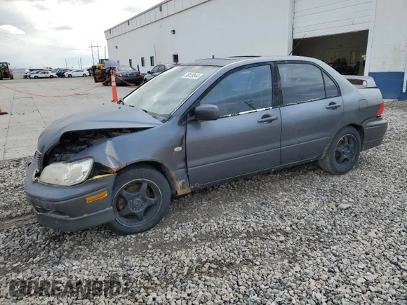 ✅ 2003 Mitsubishi Lancer OZ-Rally • VIN: JA3AJ86E33U048011 • Лот: 76129544. Опубліковано раніше на Copart з пробігом Не вказано. Безкоштовний доступ до архіву аукціонних продажів зі США та докладний звіт про історію автомобіля на DreamBid. Зображення 1.