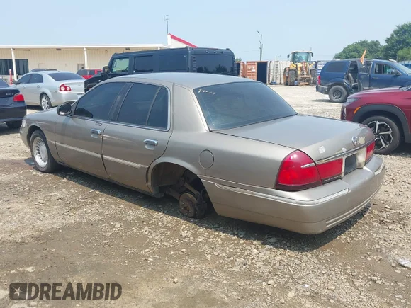 ✅ 2002 Mercury Grand Marquis LS Premium • VIN: 2MEFM75W72X638706 • Lot: 42398276. Wystawiony na IAAI z przebiegiem 201 961 mil. Bezpłatny archiwum sprzedaży aukcyjnych z USA i szczegółowy raport historii pojazdu na DreamBid. Zdjęcie 3.