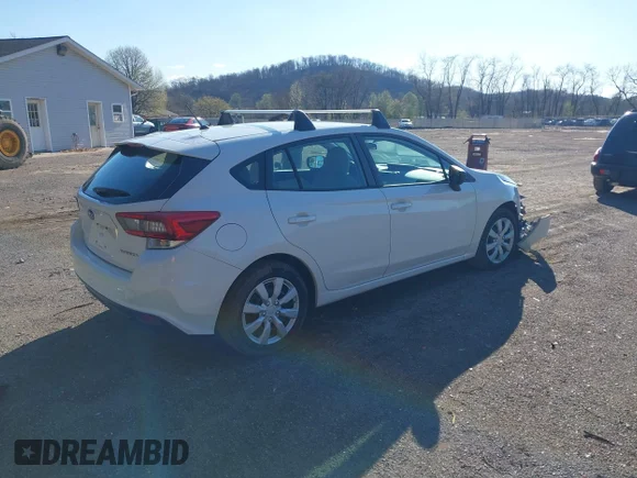 ✅ 2021 Subaru Impreza • VIN: 4S3GTAB65M3700128 • Lot: 44775368. Wystawiony na IAAI z przebiegiem 77 103 mil. Bezpłatny archiwum sprzedaży aukcyjnych z USA i szczegółowy raport historii pojazdu na DreamBid. Zdjęcie 4.