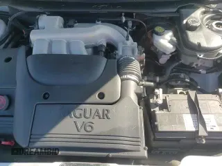 ✅ 2002 Jaguar X-Type • VIN: SAJEA51DX2XC49969 • Lot: 81042855. Listed on Copart with 61,829 mi. Free auction sales archive from the USA and detailed vehicle history report at DreamBid. Image 13.