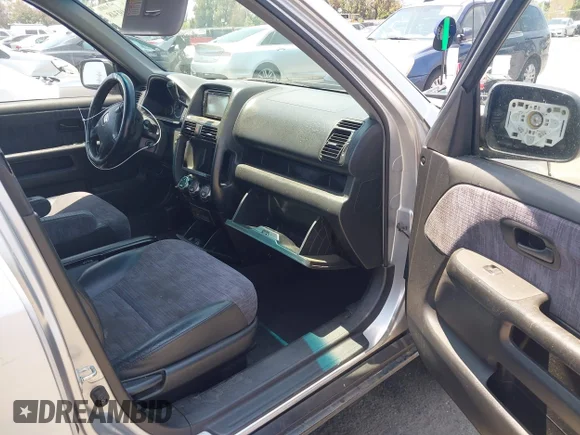 ✅ 2002 Honda CR-V LX • VIN: JHLRD68462C020022 • Lot: 45449348. Listed on IAAI with 235,730 mi. Free auction sales archive from the USA and detailed vehicle history report at DreamBid. Image 5.