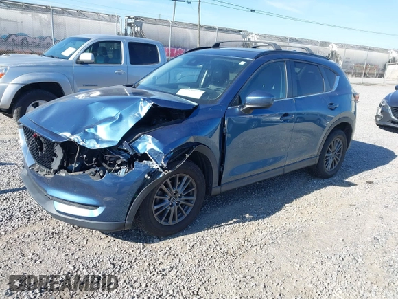 ✅ 2017 Mazda CX-5 Touring • VIN: JM3KFBCL5H0159124 • Lot: 44211772. Wystawiony na IAAI z przebiegiem 91 173 mil. Bezpłatny archiwum sprzedaży aukcyjnych z USA i szczegółowy raport historii pojazdu na DreamBid. Zdjęcie 2.