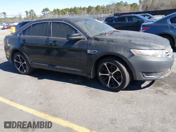 ✅ 2015 Ford Taurus SEL • VIN: 1FAHP2H82FG103849 • Lot: 44454078. Listed on IAAI with 168,424 mi. Free auction sales archive from the USA and detailed vehicle history report at DreamBid. Image 1.