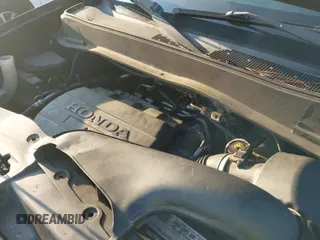 ✅ 2010 Honda Pilot EX-L • VIN: 5FNYF3H57AB008537 • Lot: 43213293. Listed on IAAI with 216,696 mi. Free auction sales archive from the USA and detailed vehicle history report at DreamBid. Image 12.