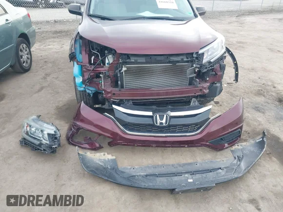 ✅ 2015 Honda CR-V LX • VIN: 2HKRM4H3XFH630038 • Lot: 44660328. Wystawiony na IAAI z przebiegiem 53 542 mil. Bezpłatny archiwum sprzedaży aukcyjnych z USA i szczegółowy raport historii pojazdu na DreamBid. Zdjęcie 6.