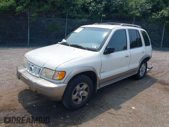 ✅ 2002 Kia Sportage • VIN: KNDJA723525148118 • Lot: 42487327. Wystawiony na IAAI z przebiegiem 135 410 mil. Bezpłatny archiwum sprzedaży aukcyjnych z USA i szczegółowy raport historii pojazdu na DreamBid. Zdjęcie 2.