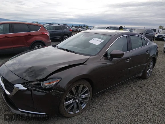 ✅ 2018 Mazda 6 Signature • VIN: JM1GL1XY5J1306212 • Лот: 44729770. Опубліковано раніше на IAAI з пробігом 77 143 миль. Безкоштовний доступ до архіву аукціонних продажів зі США та докладний звіт про історію автомобіля на DreamBid. Зображення 6.