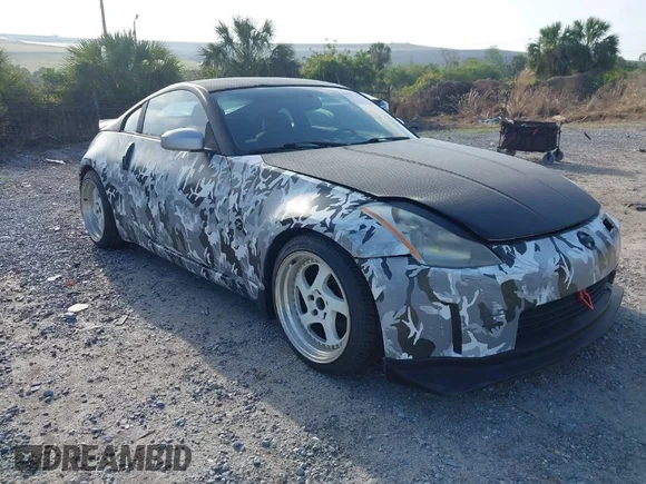 ✅ 2004 Nissan 350Z Touring • VIN: JN1AZ34D44T150578 • Lot: 41907783. Wystawiony na IAAI z przebiegiem 198 312 mil. Bezpłatny archiwum sprzedaży aukcyjnych z USA i szczegółowy raport historii pojazdu na DreamBid. Zdjęcie 1.