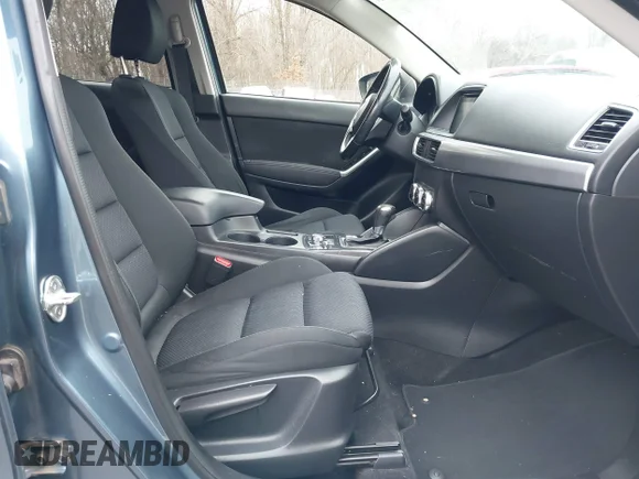 ✅ 2016 Mazda CX-5 Touring • VIN: JM3KE4CY9G0603663 • Lot: 44590187. Listed on IAAI with 172,260 mi. Free auction sales archive from the USA and detailed vehicle history report at DreamBid. Image 5.