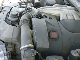 ✅ 2003 Jaguar S-Type • VIN: SAJEA01T13FM70486 • Лот: 41989501. Опубликован ранее на IAAI с пробегом 100 109 миль. Бесплатный доступ к архиву аукционных продаж из США и подробный отчёт об истории автомобиля на DreamBid. Изображение 19.