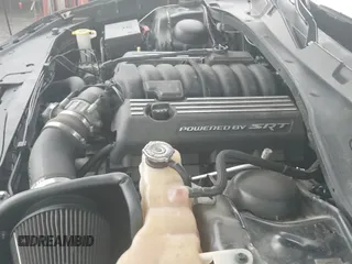 ✅ 2021 Dodge Charger Scat Pack Widebody • VIN: 2C3CDXGJ0MH562401 • Lot: 42597314. Wystawiony na IAAI z przebiegiem 17 769 mil. Bezpłatny archiwum sprzedaży aukcyjnych z USA i szczegółowy raport historii pojazdu na DreamBid. Zdjęcie 19.