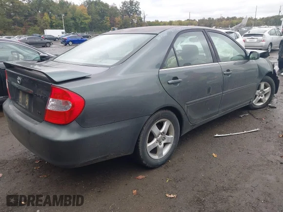 ✅ 2002 Toyota Camry LE • VIN: 4T1BF32K32U513760 • Lot: 43408992. Wystawiony na IAAI z przebiegiem 250 987 mil. Bezpłatny archiwum sprzedaży aukcyjnych z USA i szczegółowy raport historii pojazdu na DreamBid. Zdjęcie 4.