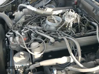 ✅ 1990 Mercedes-Benz 560 • VIN: WDBCA39E7LA505668 • Лот: 41473380. Опубликован ранее на IAAI с пробегом 159 716 миль. Бесплатный доступ к архиву аукционных продаж из США и подробный отчёт об истории автомобиля на DreamBid. Изображение 12.