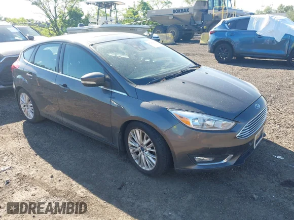 ✅ 2016 Ford Focus Titanium • VIN: 1FADP3N27GL200767 • Lot: 45242321. Listed on IAAI with 101,092 mi. Free auction sales archive from the USA and detailed vehicle history report at DreamBid. Image 1.