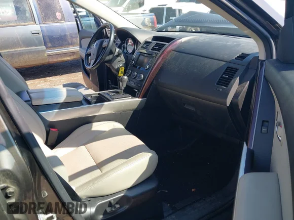 ✅ 2015 Mazda CX-9 Grand Touring • VIN: JM3TB3DV8F0465155 • Лот: 42366636. Опубліковано раніше на IAAI з пробігом 125 407 миль. Безкоштовний доступ до архіву аукціонних продажів зі США та докладний звіт про історію автомобіля на DreamBid. Зображення 5.