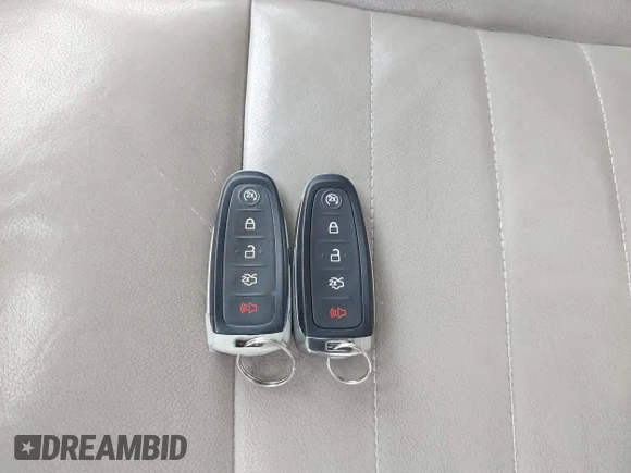 ✅ 2014 Ford Escape Titanium • VIN: 1FMCU9J99EUD60012 • Lot: 45584317. Wystawiony na IAAI z przebiegiem 130 311 mil. Bezpłatny archiwum sprzedaży aukcyjnych z USA i szczegółowy raport historii pojazdu na DreamBid. Zdjęcie 11.