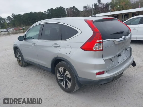 ✅ 2015 Honda CR-V Touring • VIN: 5J6RM3H95FL021220 • Lot: 44573452. Wystawiony na IAAI z przebiegiem 126 541 mil. Bezpłatny archiwum sprzedaży aukcyjnych z USA i szczegółowy raport historii pojazdu na DreamBid. Zdjęcie 3.