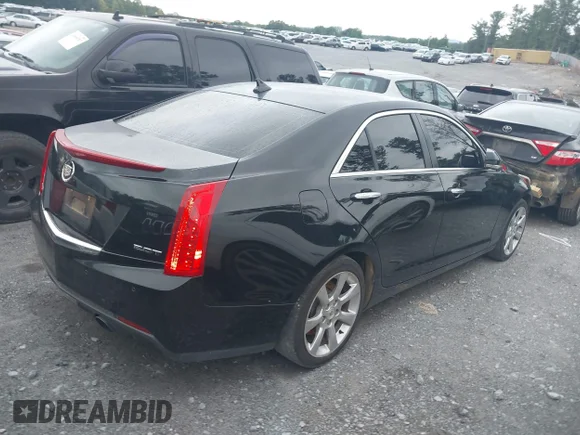 ✅ 2014 Cadillac ATS Luxury RWD • VIN: 1G6AB5RXXE0105344 • Лот: 42884136. Опубліковано раніше на IAAI з пробігом 185 000 миль. Безкоштовний доступ до архіву аукціонних продажів зі США та докладний звіт про історію автомобіля на DreamBid. Зображення 4.