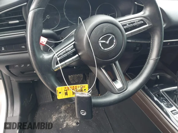 ✅ 2023 Mazda CX-30 S Premium • VIN: 3MVDMBDM0PM525788 • Лот: 44931745. Опубліковано раніше на IAAI з пробігом 76 689 миль. Безкоштовний доступ до архіву аукціонних продажів зі США та докладний звіт про історію автомобіля на DreamBid. Зображення 11.