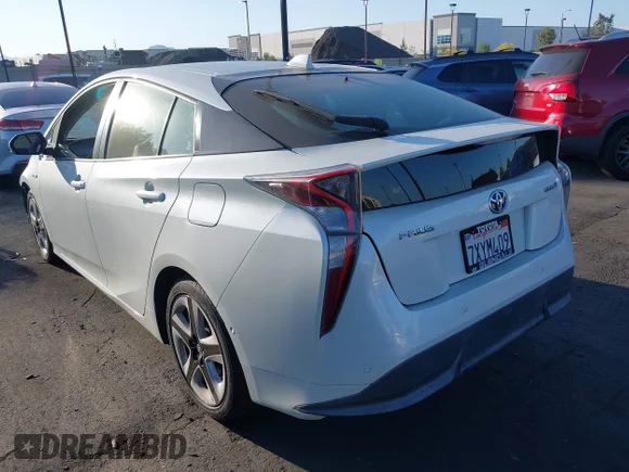 ✅ 2017 Toyota Prius Two • VIN: JTDKARFU2H3532848 • Lot: 42386490. Listed on IAAI with 140,728 mi. Free auction sales archive from the USA and detailed vehicle history report at DreamBid. Image 3.