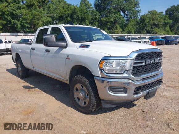 ✅ 2024 Ram 2500 Tradesman • VIN: 3C6UR5HL0RG103115 • Lot: 42903054. Listed on IAAI with 32,262 mi. Free auction sales archive from the USA and detailed vehicle history report at DreamBid. Image 1.