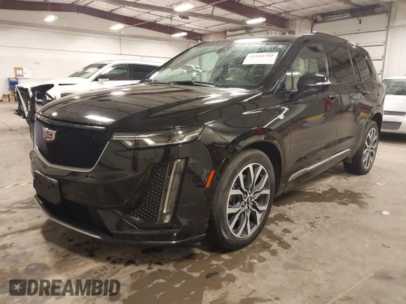 ✅ 2021 Cadillac XT6 Sport • VIN: 1GYKPGRS7MZ203710 • Лот: 43550792. Опубліковано раніше на IAAI з пробігом 50 187 миль. Безкоштовний доступ до архіву аукціонних продажів зі США та докладний звіт про історію автомобіля на DreamBid. Зображення 2.
