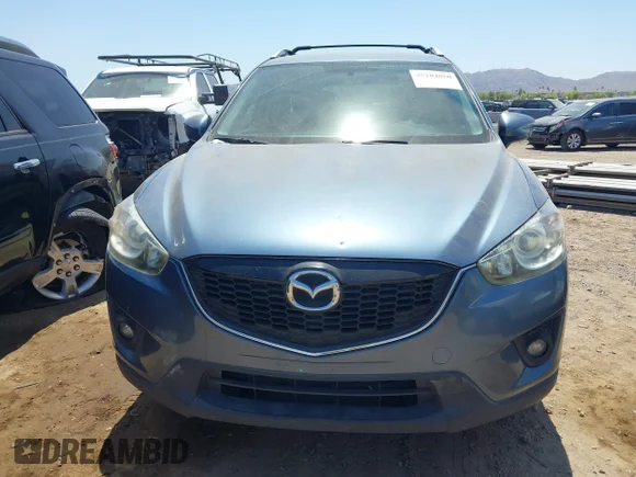 ✅ 2015 Mazda CX-5 Touring • VIN: JM3KE2CY2F0524810 • Lot: 45104050. Listed on IAAI with 186,534 mi. Free auction sales archive from the USA and detailed vehicle history report at DreamBid. Image 6.