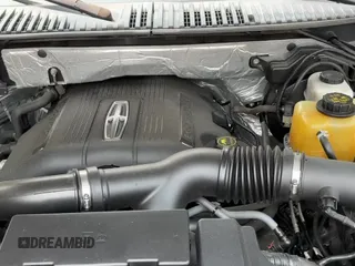 ✅ 2015 Lincoln Navigator • VIN: 5LMJJ2JT2FEJ12261 • Lot: 84904785. Listed on Copart with 176,293 mi. Free auction sales archive from the USA and detailed vehicle history report at DreamBid. Image 11.