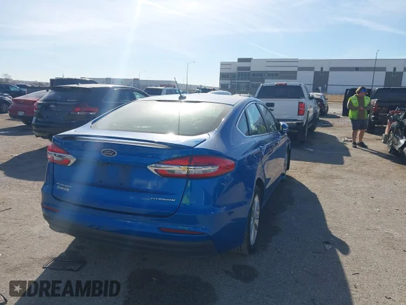 ✅ 2019 Ford Fusion Titanium • VIN: 3FA6P0SUXKR286857 • Lot: 44105072. Wystawiony na IAAI z przebiegiem 91 293 mil. Bezpłatny archiwum sprzedaży aukcyjnych z USA i szczegółowy raport historii pojazdu na DreamBid. Zdjęcie 4.