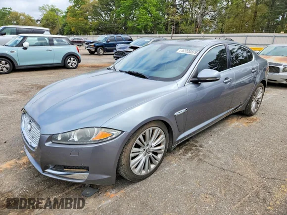 ✅ 2012 Jaguar XF Portfolio • VIN: SAJWA0HB8CLS37854 • Lot: 47220876. Wystawiony na Copart z przebiegiem 134 811 mil. Bezpłatny archiwum sprzedaży aukcyjnych z USA i szczegółowy raport historii pojazdu na DreamBid. Zdjęcie 1.