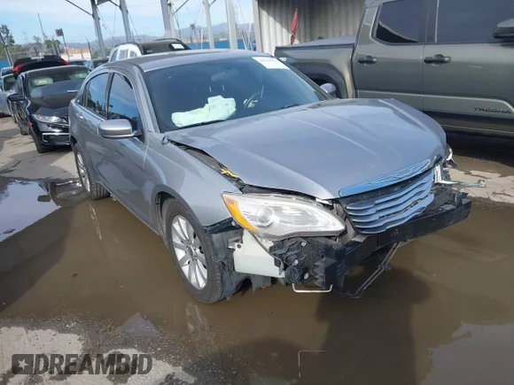 ✅ 2014 Chrysler 200 Touring • VIN: 1C3CCBBG5EN115184 • Lot: 44388153. Listed on IAAI with 134,419 mi. Free auction sales archive from the USA and detailed vehicle history report at DreamBid. Image 1.