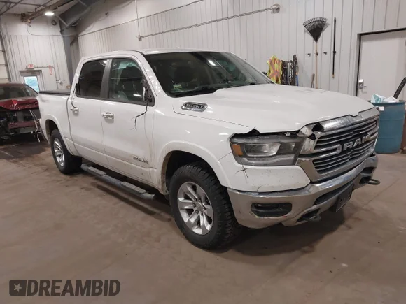 ✅ 2021 Ram 1500 Laramie • VIN: 1C6SRFJT1MN791147 • Lot: 44034138. Wystawiony na IAAI z przebiegiem 59 451 mil. Bezpłatny archiwum sprzedaży aukcyjnych z USA i szczegółowy raport historii pojazdu na DreamBid. Zdjęcie 1.