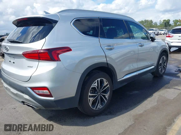 ✅ 2019 Hyundai Santa Fe Limited • VIN: 5NMS53AA3KH015002 • Лот: 43390736. Опубліковано раніше на IAAI з пробігом 103 123 миль. Безкоштовний доступ до архіву аукціонних продажів зі США та докладний звіт про історію автомобіля на DreamBid. Зображення 4.