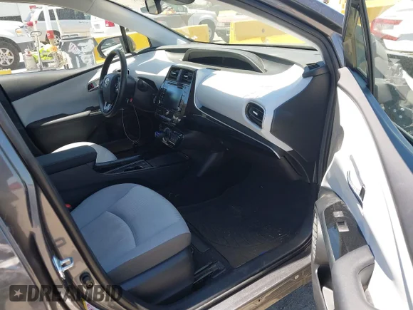 ✅ 2021 Toyota Prius LE • VIN: JTDKAMFP1M3165500 • Лот: 45490968. Опубликован ранее на IAAI с пробегом 27 430 миль. Бесплатный доступ к архиву аукционных продаж из США и подробный отчёт об истории автомобиля на DreamBid. Изображение 5.