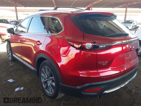 ✅ 2021 Mazda CX-9 Grand Touring • VIN: JM3TCBDYXM0533115 • Лот: 42288453. Опубліковано раніше на IAAI з пробігом 50 137 миль. Безкоштовний доступ до архіву аукціонних продажів зі США та докладний звіт про історію автомобіля на DreamBid. Зображення 3.