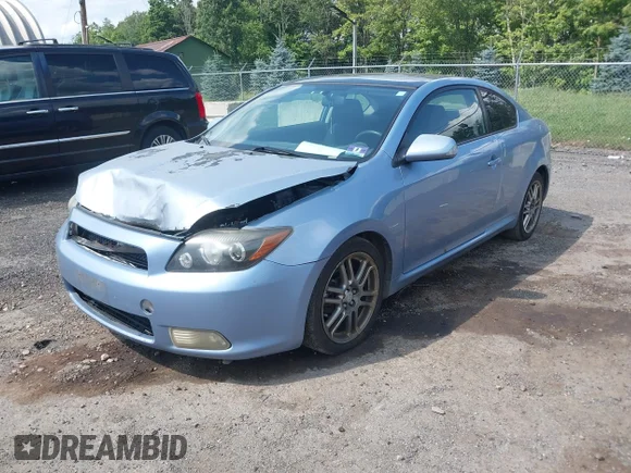 ✅ 2010 Scion tC • VIN: JTKDE3B7XA0306728 • Lot: 42696554. Listed on IAAI with 189,559 mi. Free auction sales archive from the USA and detailed vehicle history report at DreamBid. Image 2.