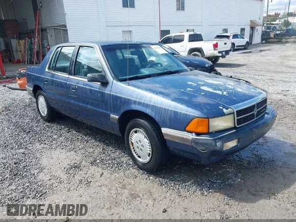 ✅ 1990 Dodge Spirit • VIN: 1B3XA46K4LF740648 • Лот: 43032814. Опубликован ранее на IAAI с пробегом 56 309 миль. Бесплатный доступ к архиву аукционных продаж из США и подробный отчёт об истории автомобиля на DreamBid. Изображение 1.