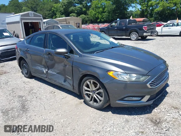 ✅ 2017 Ford Fusion Hybrid SE • VIN: 3FA6P0LU8HR296259 • Лот: 45299404. Опубликован ранее на IAAI с пробегом 272 710 миль. Бесплатный доступ к архиву аукционных продаж из США и подробный отчёт об истории автомобиля на DreamBid. Изображение 1.