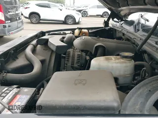 ✅ 2004 Chevrolet Suburban LS • VIN: 1GNEC16T54J331703 • Лот: 42023849. Опубликован ранее на IAAI с пробегом 135 843 миль. Бесплатный доступ к архиву аукционных продаж из США и подробный отчёт об истории автомобиля на DreamBid. Изображение 14.