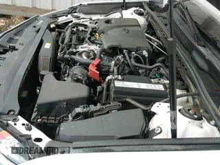 ✅ 2019 Toyota Camry LE • VIN: 4T1B11HK9KU256694 • Lot: 43662801. Listed on IAAI with 158,363 mi. Free auction sales archive from the USA and detailed vehicle history report at DreamBid. Image 19.