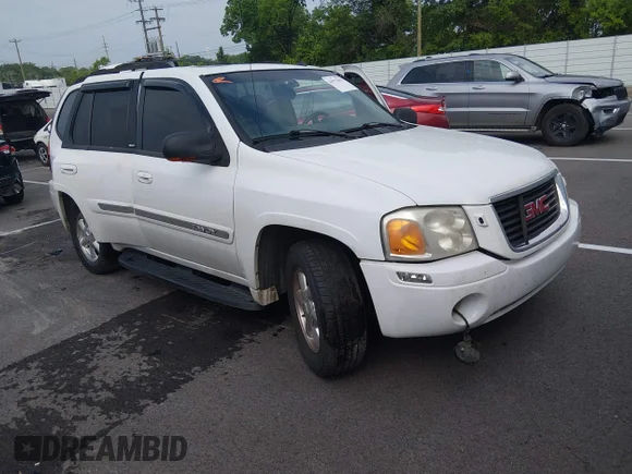 ✅ 2004 GMC Envoy SLE • VIN: 1GKDS13S642314457 • Lot: 44975662. Listed on IAAI with 165,192 mi. Free auction sales archive from the USA and detailed vehicle history report at DreamBid. Image 1.