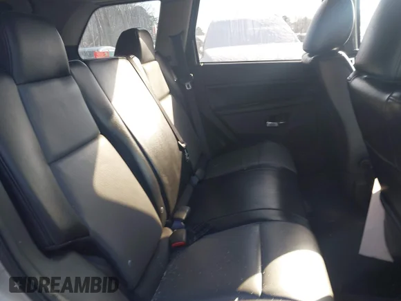 ✅ 2010 Jeep Grand Cherokee Laredo • VIN: 1J4PR4GK9AC139427 • Lot: 44189587. Listed on IAAI with 156,961 mi. Free auction sales archive from the USA and detailed vehicle history report at DreamBid. Image 8.