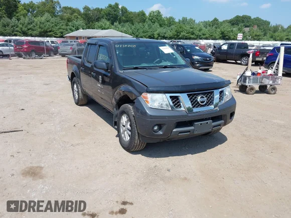 ✅ 2015 Nissan Frontier SV • VIN: 1N6AD0EVXFN765819 • Lot: 42810060. Listed on IAAI with 133,249 mi. Free auction sales archive from the USA and detailed vehicle history report at DreamBid. Image 1.
