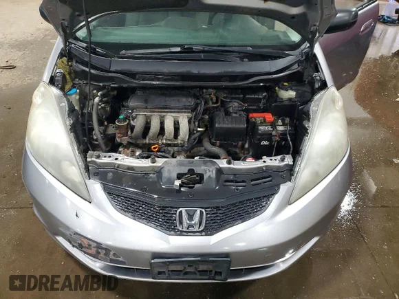 ✅ 2009 Honda Fit • VIN: JHMGE88249S008865 • Lot: 51548586. Wystawiony na Copart z przebiegiem 243 021 mil. Bezpłatny archiwum sprzedaży aukcyjnych z USA i szczegółowy raport historii pojazdu na DreamBid. Zdjęcie 11.
