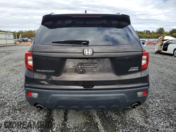✅ 2019 Honda Passport Sport • VIN: 5FNYF8H26KB014057 • Lot: 82300395. Wystawiony na Copart z przebiegiem 79 114 mil. Bezpłatny archiwum sprzedaży aukcyjnych z USA i szczegółowy raport historii pojazdu na DreamBid. Zdjęcie 6.